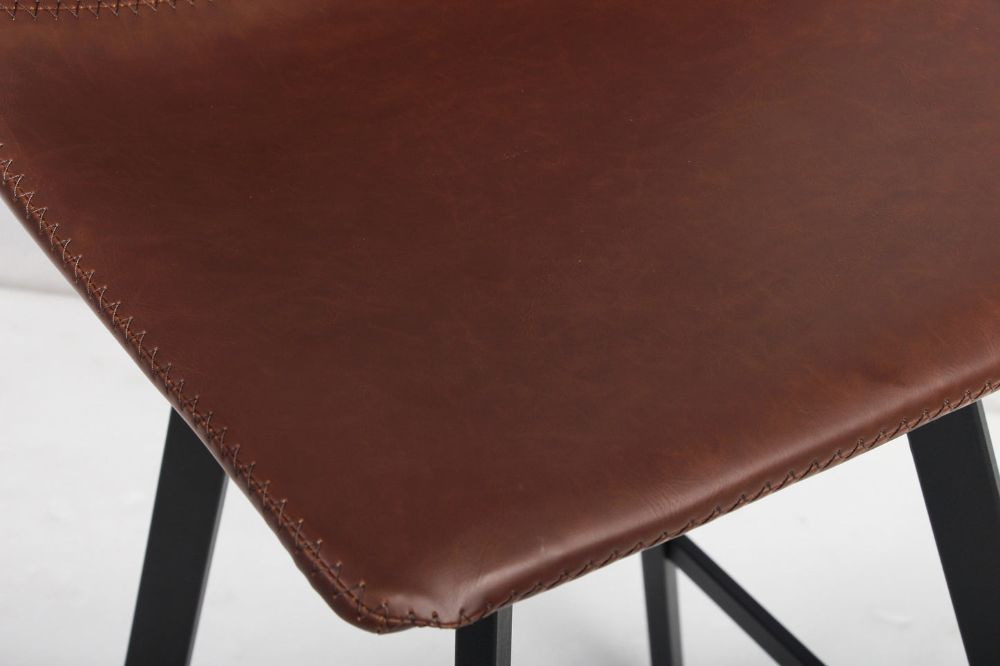 Tellerstoel 'Ozan' PU Bruin